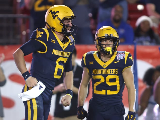 West Virginia battles but can't complete comeback in Frisco Bowl loss