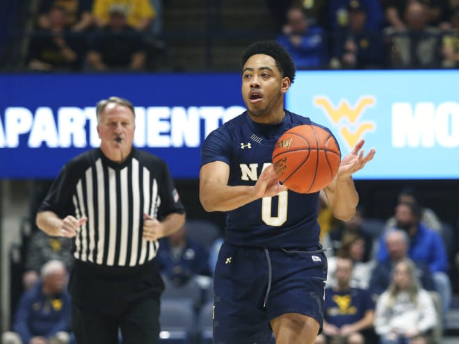 Jones scores 20, leads Navy over Towson 71-69 in overtime