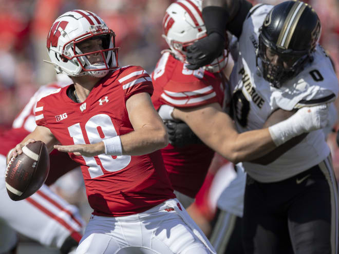 Locke throws for 359 yards, 3 TDs as Wisconsin steamrolls slumping Purdue