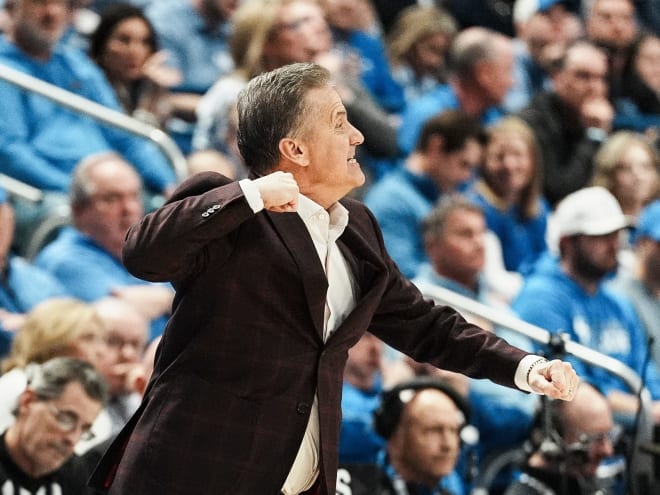 Calipari shrugs off emotions, celebrates win at Kentucky