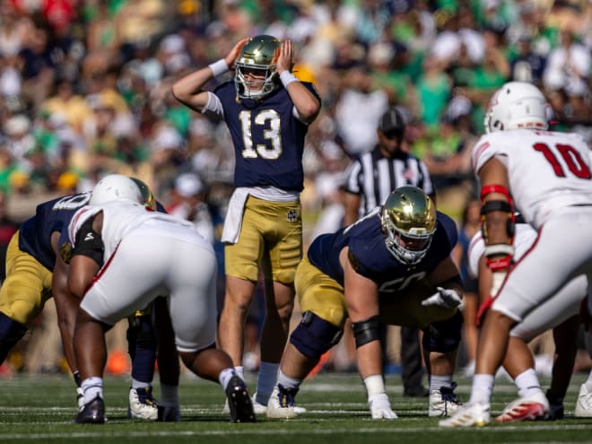 Boos, slow start for Notre Dame can't shake Freeman's faith in his QB