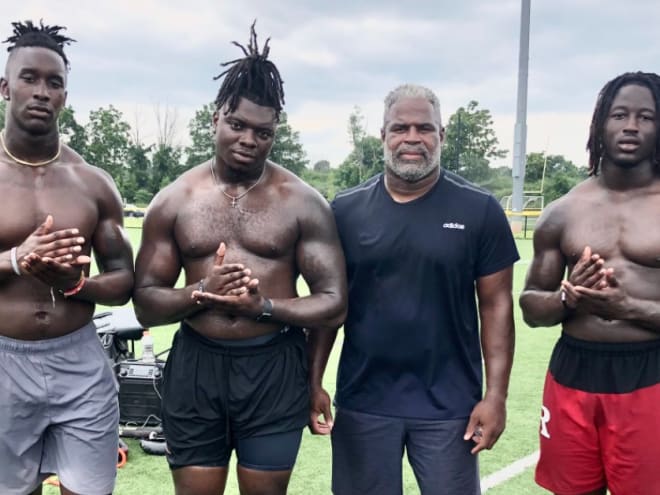 DLine trainer Leeroy Thompson working with Rutgers Football athletes