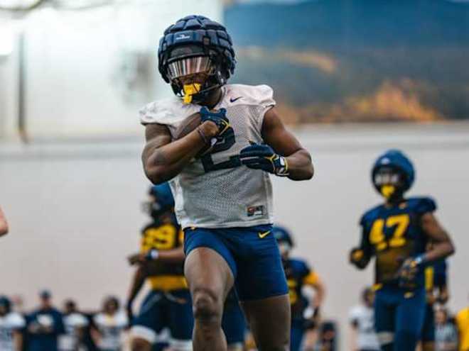 Porter inherits talented West Virginia RB room