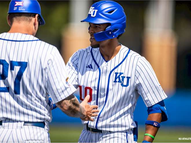 Cincinnati takes series from Kansas in offensive explosion