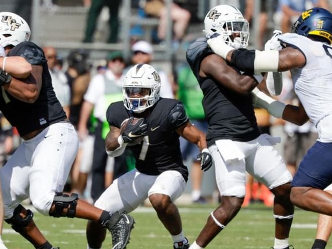 West Virginia facing challenge in UCF rushing attack led by Harvey