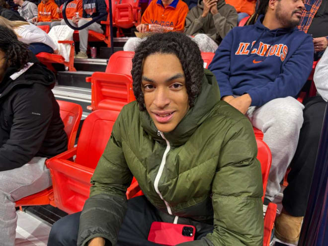 Junior wing Lincoln Williams checks out Illinois