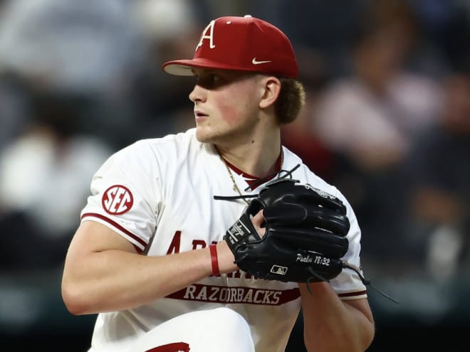 Razorbacks escape late Michigan rally to win, 8-6