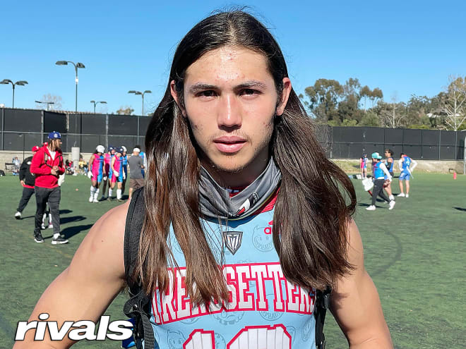 Stat-machine WR Tiger Bachmeier looking at visits