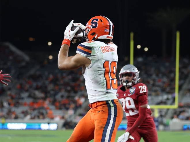 McCord dazzles as Syracuse tops Washington State in Holiday Bowl