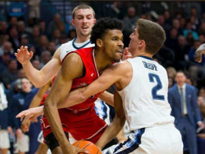 Booth rallies champion Wildcats past No. 24 St. John’s