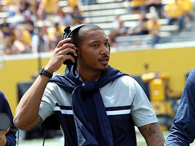 From players to coaches: Rodriguez still surrounded by his guys