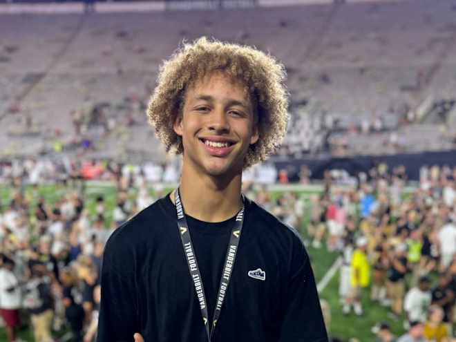 Louisville to IMG corner Man Robinson drawing big offers