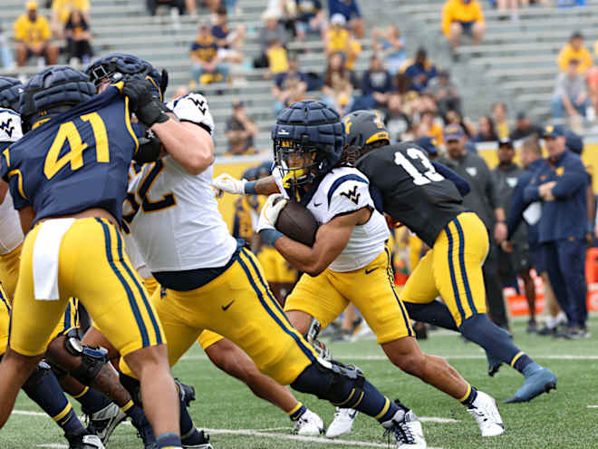 West Virginia is building a good mix in the backfield