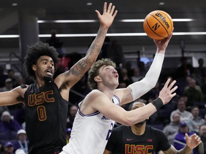 Martinelli wills Wildcats over USC, 77-75