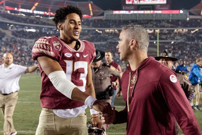 Florida State quarterback Jordan Travis celebrates Saturday after helping the Seminoles beat rival Miami.