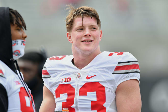 Jack Sawyer played in all 13 games and recorded three sacks during his freshman season in 2021.