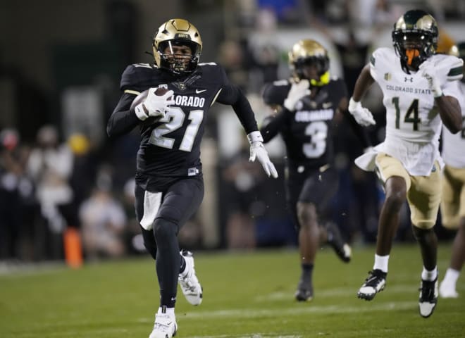 Shiloh Sanders returns an interception for a touchdown in Saturday's Rocky Mountain Showdown.