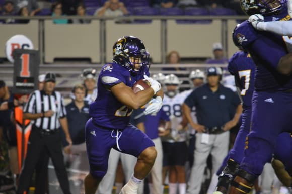Pirate running back Darius Pinnix finds daylight in ECU's 33-17 homecoming victory over BYU.