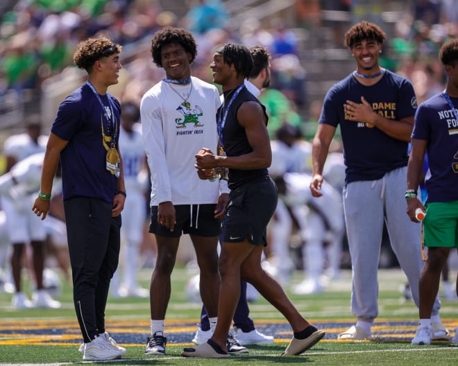 On Sunday, Notre Dame football hired Mike Brown as its new wide receivers coach. Inside ND Sports caught up with 2024 WR commit Cam Williams (in white) to get his thoughts on the hire and more.