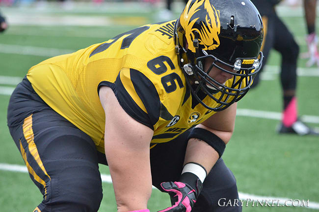 Missouri offensive lineman Adam Ploudre had schools from all over calling him before a gruesome injury in high school. 