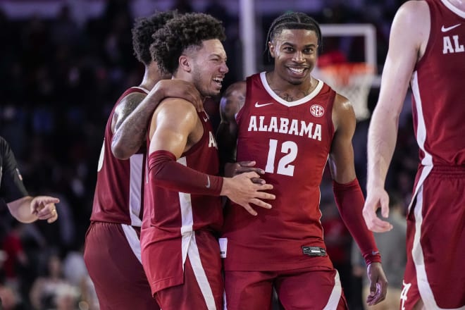 Alabama Crimson Tide guards Mark Sears (1) and Latrell Wrightsell Jr. (12) react after a comeback win against the Georgia Bulldogs at Stegeman Coliseum. Photo | Dale Zanine-USA TODAY Sports