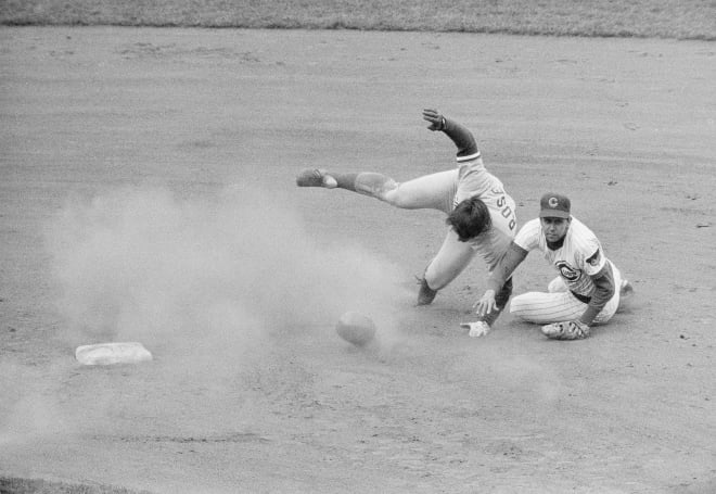Don Kessinger forces out Pete Rose, who then takes a tumble across the second base bag. 
