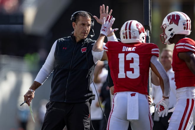 Wisconsin head coach Luke Fickell and wide out Chimere Dike. 