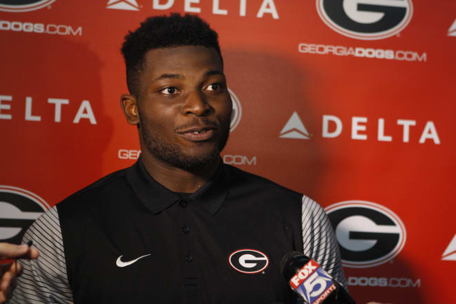 Lorenzo Carter said he isn't worried about big hits, only getting quarterbacks on the ground.
