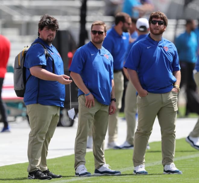Joe Grilz (right) is SMU's assistant director of player personnel.