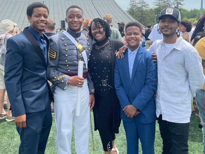 Jordan after graduation with his brothers and Mom (Lisa)