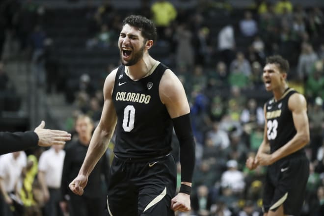 Luke O'Brien celebrates after Colorado's win over Oregon on March 7.