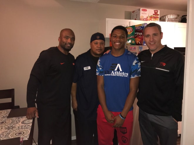 Jeffrey Manning Jr. with his father, Jeff Sr., Cory Hall, and Kevin McGiven