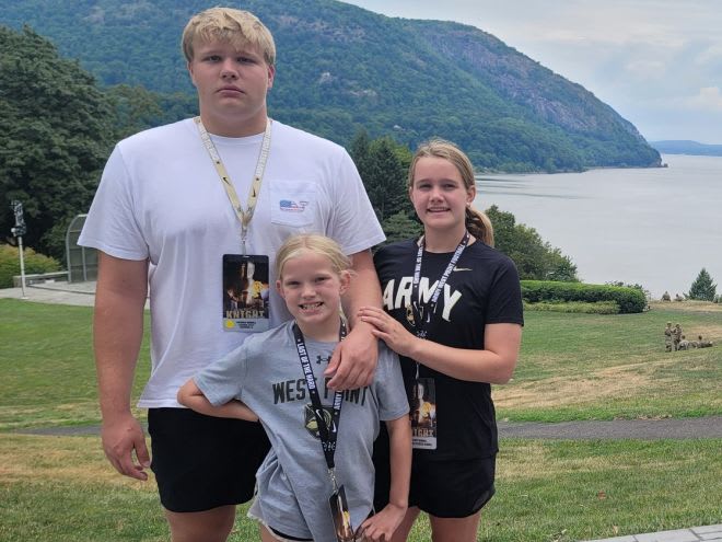 Army commit & DT Patrick Kendall with younger sisters during his unofficial to West Point