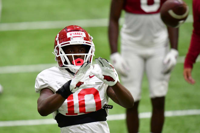 Wide receiver De'Vion Warren makes a grab during Tuesday's practice.