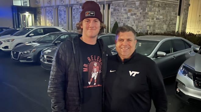 Ball with his lead recruiter, Hokies RB coach Stu Holt