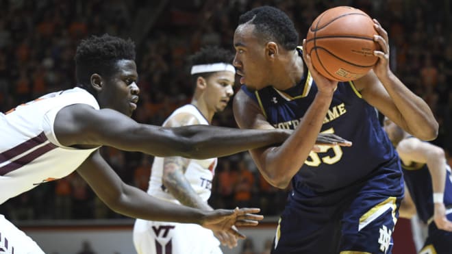 Notre Dame's Bonzie Colson (right) faces up a defender during Saturday's win over Virginia Tech.