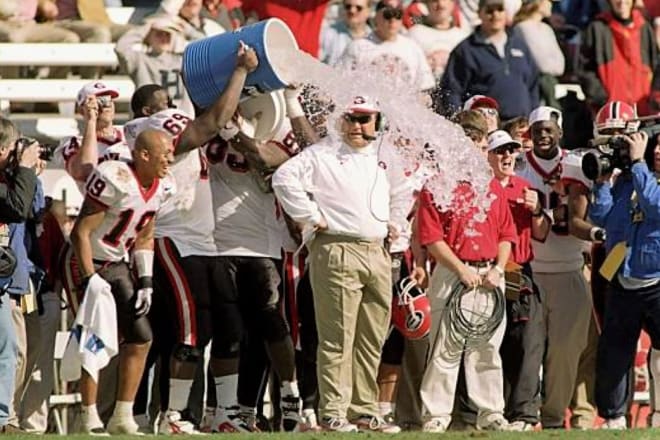 Only a couple of days after Georgia won the 1998 Outback Bowl, Jim Donnan (center) added Rodney Garner to his staff to serve as not only defensive line coach, but recruiting coordinator, as well.