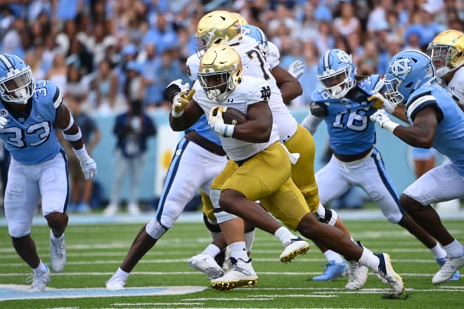 Irish running back Audric Estime (with ball) flourished Saturday against North Carolina behind Notre Dame's dominant offensive line.