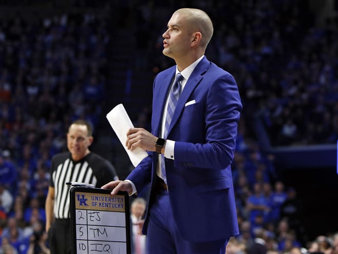 Kentucky assistant coach worked on defensive assignments during a game this season.