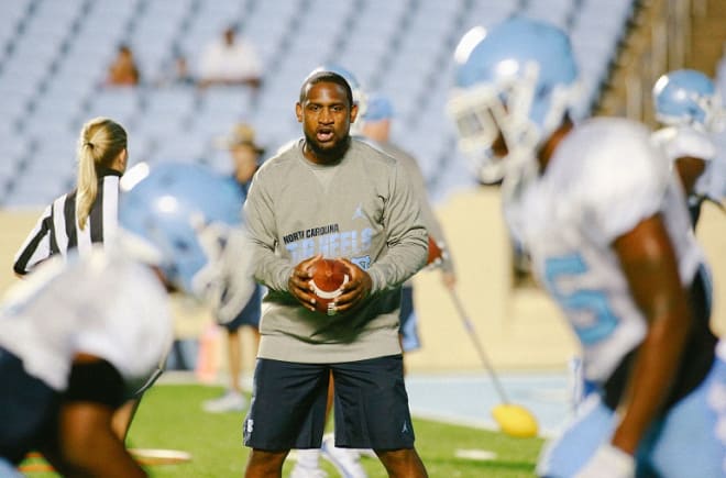 UNC legend and assistant coach Dre' Bly carries with him a unique reptertoire few peers come close to matching.