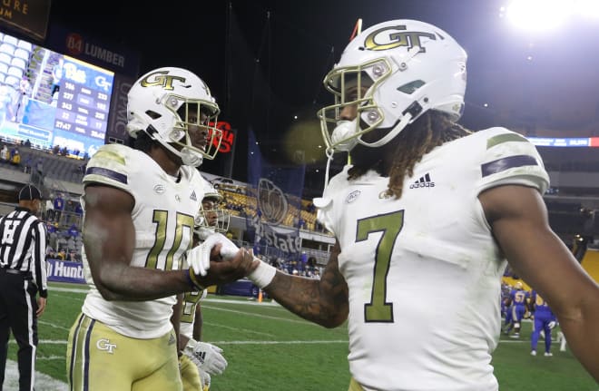 Georgia Tech quarterback Jeff Sims, left, and Malachi Carter celebrate during last week's win at Pittsburgh. 