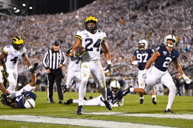 Michigan back Zach Charbonnet finds the end zone last season at Penn State's Beaver Stadium.
