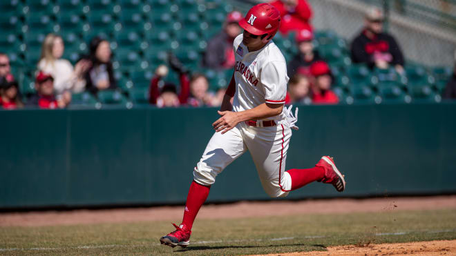 Junior outfielder Leighton Banjoff rounds third base.