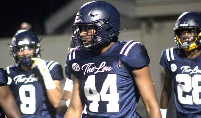 California defensive end Kevonte Henry is committed to Michigan Wolverines football recruiting, Jim Harbaugh.
