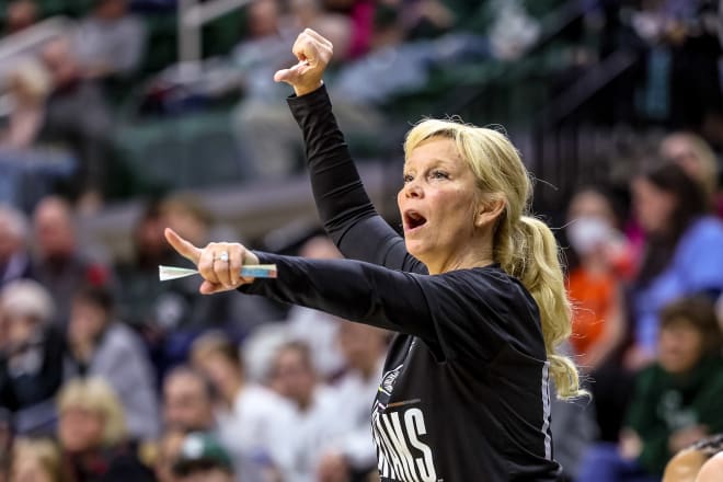 Suzy Merchant coaches her team during a home game against Wisconsin in 2023