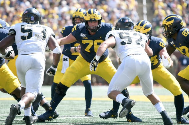 Michigan Wolverines football's offensive line was banged up last year, but is ready to atone for a poor 2020.