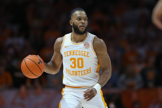 Dec 5, 2023; Knoxville, Tennessee, USA; Tennessee Volunteers guard Josiah-Jordan James (30) dribbles against the George Mason Patriots during the first half at Thompson-Boling Arena at Food City Center. 