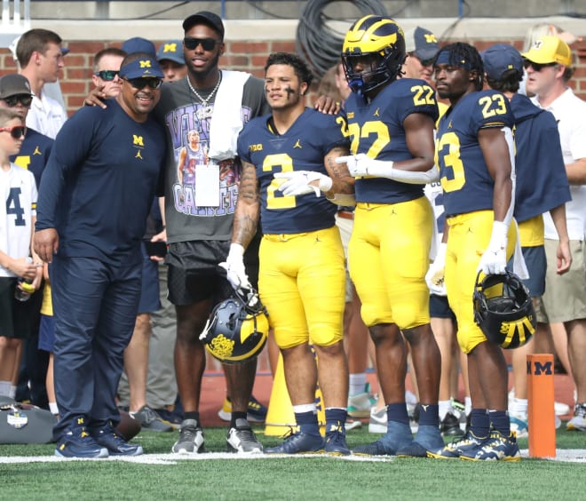 Hart (left) with Hassan Haskins (former U-M RB), Blake Corum, Tavierre Dunlap, and CJ Stokes. (USA Today)