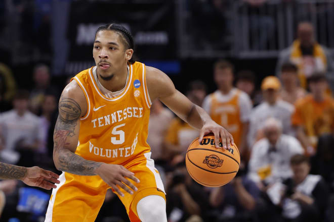 Mar 31, 2024; Detroit, MI, USA; Tennessee Volunteers guard Zakai Zeigler (5) dribbles the ball in the first half against the Purdue Boilermakers during the NCAA Tournament Midwest Regional Championship at Little Caesars Arena.