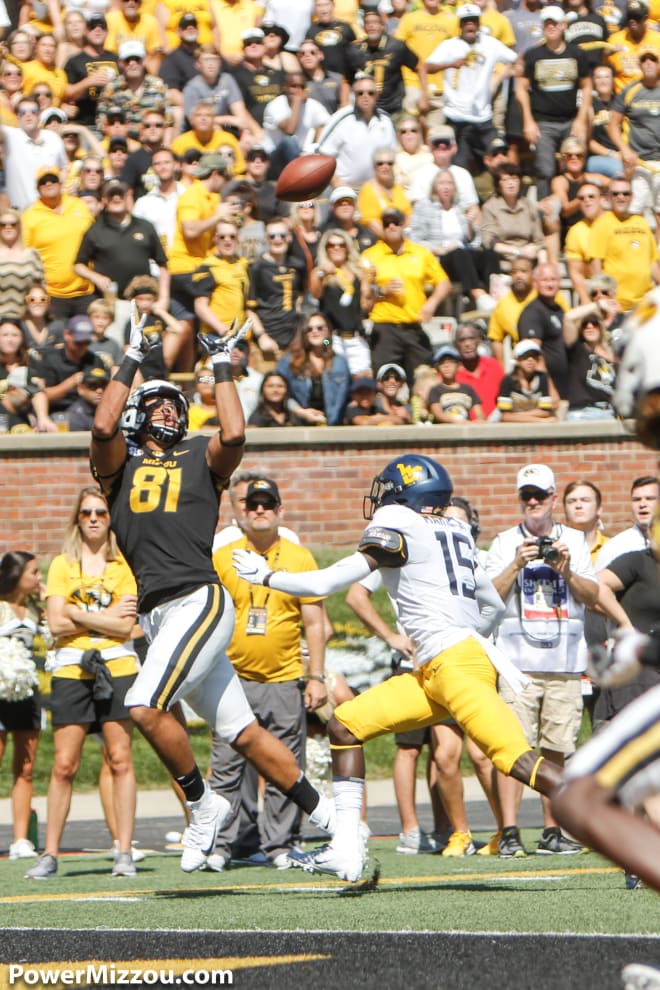 Okwuegbunam hauls in a touchdown pass in the corner of the end zone, his first of two on the day.